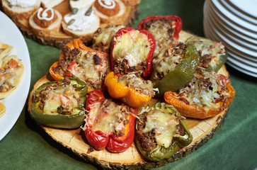 Sweet pepper stuffed with grinded meat, rice, vegetable and cheese