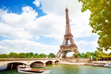 Fototapeta na wymiar Boats, bridge Pont d'Iena and Eifel tower, Paris