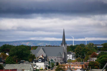 Fototapeta na wymiar View of the city near the Ferry Terminal during a cloudy Autumn Day. Taken in North Sydney, Nova Scotia, Canada.
