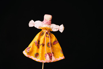 Traditional Russian stuffed on pancake week. Straw effigy for the traditional Slavic holiday - Carnival. Homemade dolls with hay for children.