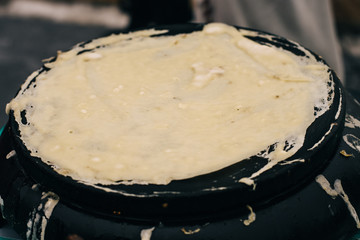 professional crepe maker at a street festival. pancake pancake pancake week