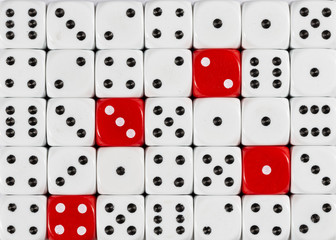 Background of random ordered white dices with four red cubes
