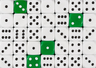 Background of random ordered white dices with four green cubes