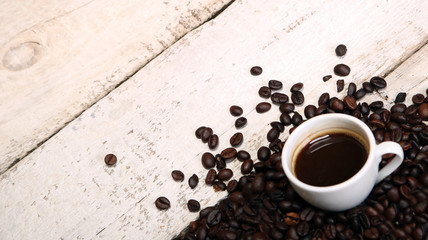 Coffee cup and coffee beans