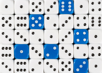 Background of random ordered white dices with six blue cubes