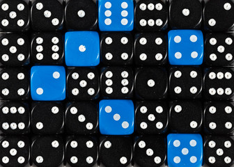 Background of random ordered black dices with six blue cubes