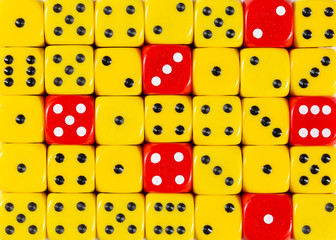 Background of random ordered yellow dices with six red cubes