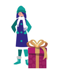 woman with winter clothes and christmas gift