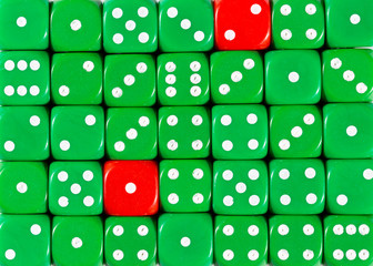 Background of random ordered green dices with two red cubes