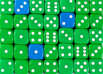 Background of random ordered green dices with three blue cubes
