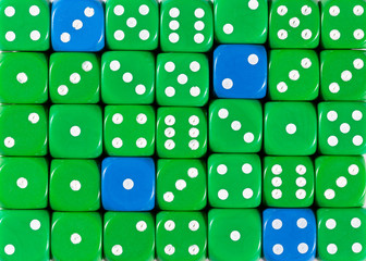 Background of random ordered green dices with four blue cubes