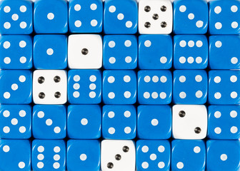 Background of random ordered blue dices with five white cubes
