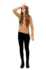 Full-length shot of Young woman with beret has just realized something and has intending the solution on isolated white background