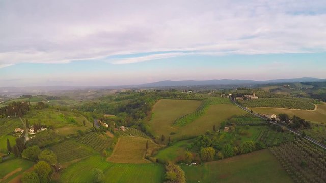 SAN GIMIGIANO, ITALY-APRIL 2017. Aerial view of nature landscape beautiful hills forests fields and vineyards Tuscany, Italy