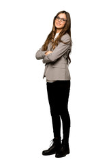 Full-length shot of Business woman with arms crossed and looking forward on isolated white background