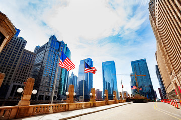 Fototapeta premium American flag and embarkment in downtown Chicago