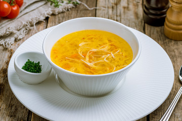 Chicken soup bouillon in a plate