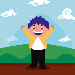 smiling boy hands up outdoors