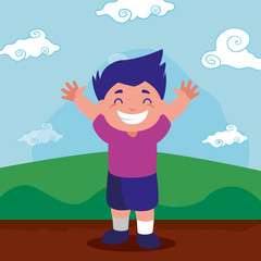 smiling boy hands up outdoors