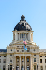 Fototapeta na wymiar South Dakota Capitol Building under blue sky