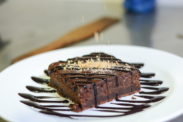 cake, chocolate, background, delicious, brown, homemade, food, sweet, dessert, bake, wooden, dark, tasty, table, bakery, restaurant, cook, slice, black, pastry, fresh, cream, icing, pie, napkin, white
