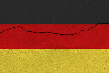 germany flag on concrete wall with crack
