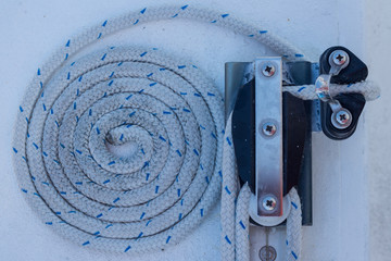 coiled rope. white coiled rope detail closeup ready to set sail