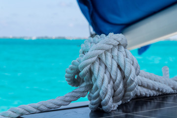 closeup on sailing rope. detail shot on coiled rope ready to set sail
