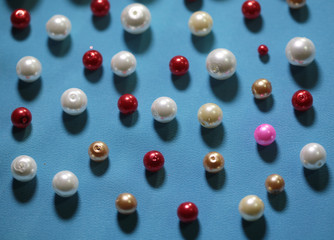 beads on colored background