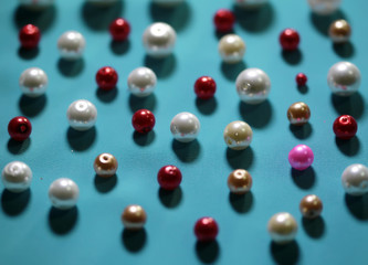 beads on colored background