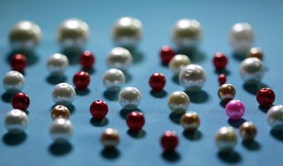 beads on colored background