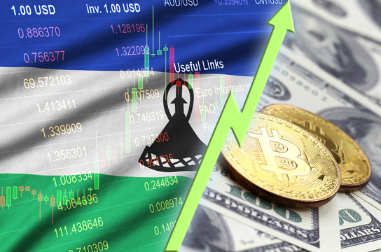 Lesotho flag and cryptocurrency growing trend with two bitcoins on dollar bills