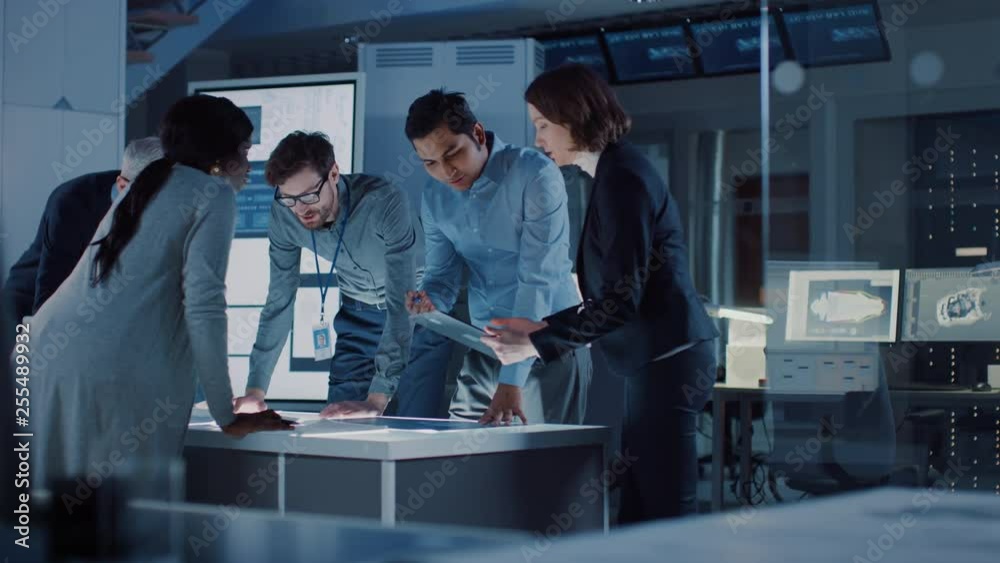 Aufkleber Engineers Meeting in Technology Research Laboratory: Engineers, Scientists and Developers Gathered Around Illuminated Conference Table, Talking and Finding Solution. Industrial Design Facility 