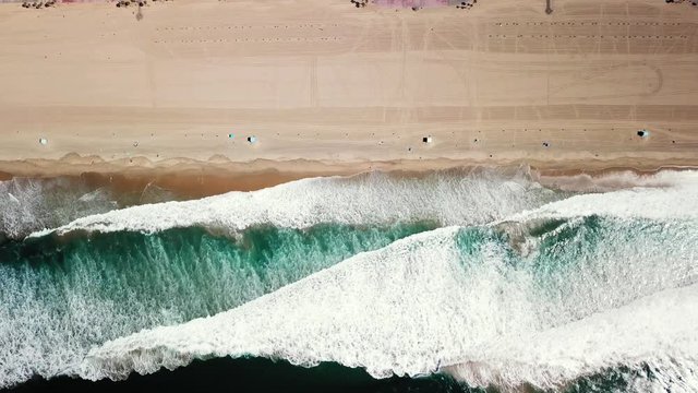 4K Drone Aerial Of Huntington Beaches Looking Down On Pacific Ocean