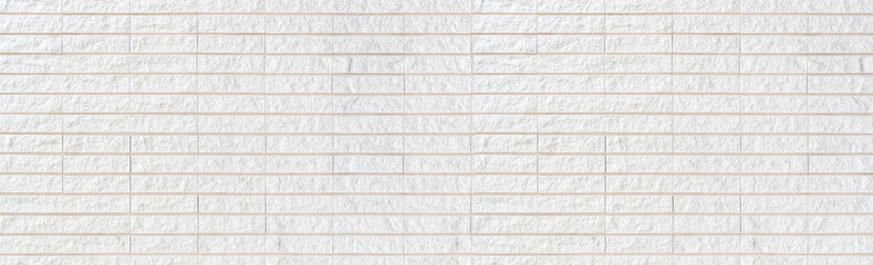 Panorama of White concrete tile wall pattern and background