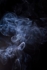 Smoke on a black background.