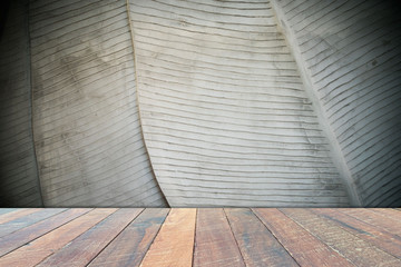 wall gray , vintage wall Textured background and empty wood desk .Blank space for text and images.