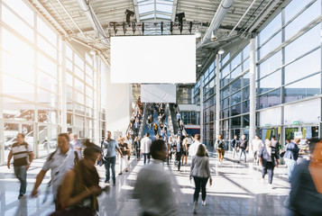 crowd of blurred business people, with copy space banner