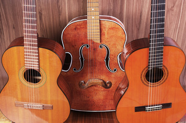 Fototapeta na wymiar Three vintage acoustic guitars.