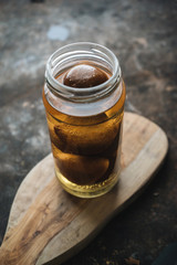 Pickled lemon on rustic background