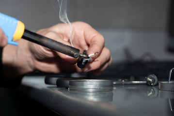 work with a soldering iron. laptop charging cord repair