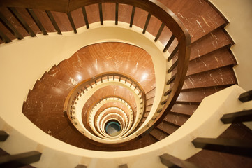 Spiral staircase, steep descent down the stairs