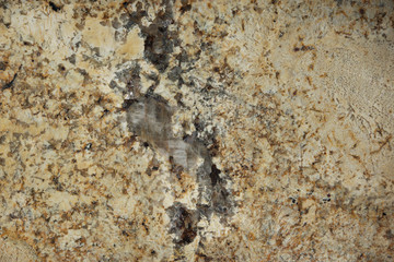 Natural granite of beige color with dark specks and streaks, is called Tenero