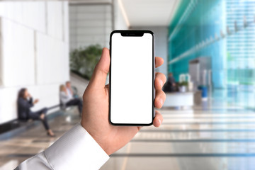 Business man hand holding smartphone at work, app, advertisement, blank card, copy space