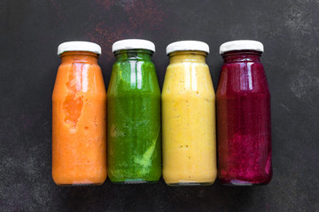 Colourful smoothies bottles