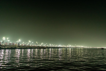 Kumbha Mela, Allahabad, Uttar Pradesh, India; 17-Feb-2019; night lights over the river bank, Sangam...