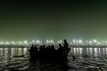 Kumbha Mela, Allahabad, Uttar Pradesh, India; 17-Feb-2019; boat ride on Triveni Sangam at night,...