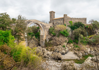 Vulci (Italy) - The medieval castle of Vulci, now museum, with Devil's bridge. Vulci is an etruscan...