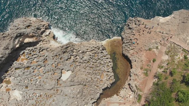 Angel's Billabong beach, the natural pool on the island of Nusa Penida. Aerial view. Bali, Indonesia.