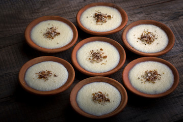 phirni - sweet rice pudding - traditional punjabi sweet dish in earthen plate